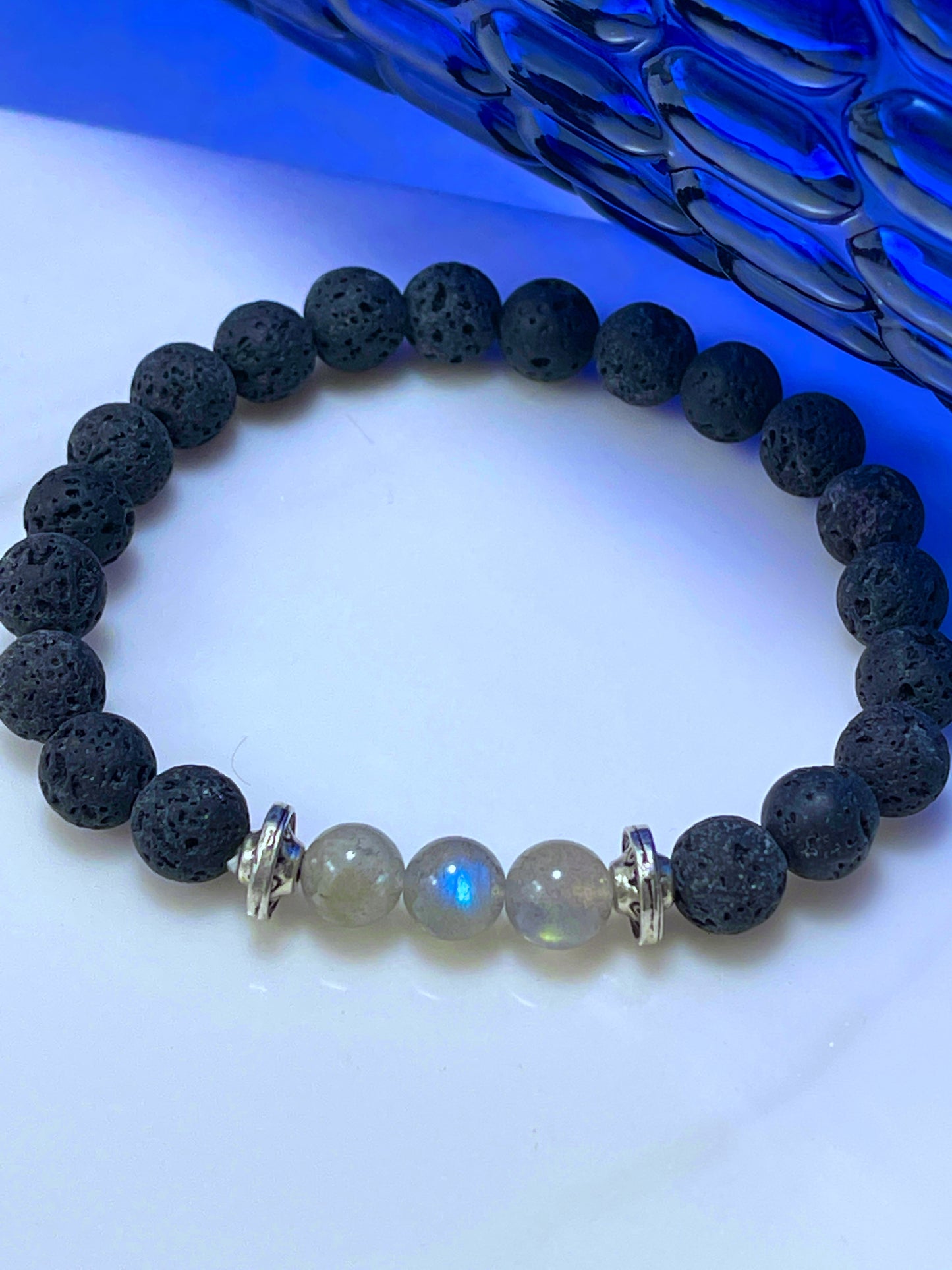 Rainbow Moonstone Lava Stone Bracelet can be used for calming, awakening the inner goddess, aromatherapy